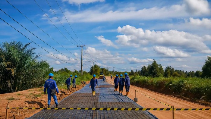 1761866639519-akses-pembangunan-jalan-yang-dilakukan-pt-oki-pulp-paper-mills-di-jalan-pasar-jetty-baung-1761835098224_169