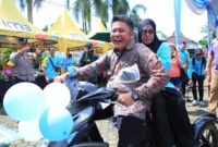 1765127140721-bantuan-motor-roda-tiga-yang-diserahkan-untuk-difabel-1765099093051_169