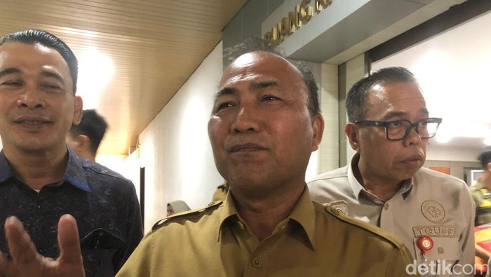 1765256773913-asisten-i-setda-sumsel-apriyadi-1765208419168_169