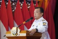 1765386354421-gubernur-jambi-al-haris-dalam-kata-sambutan-saat-beri-penghargaan-28-perusahaan-raih-zero-accident-1765351534003_169