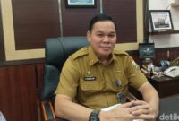 1766099099222-kepala-bkpsdm-kota-palembang-yanuarpan-yani-1766079016400_169