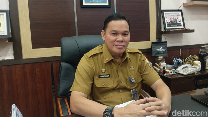 1766099099222-kepala-bkpsdm-kota-palembang-yanuarpan-yani-1766079016400_169