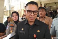 1766120831303-kepala-badan-pendapatan-daerah-bapenda-sumsel-achmad-rizan-1766049631830_169