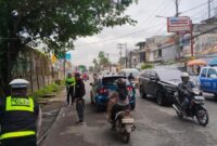 1767935177151-polisi-saat-olah-tkp-kecelakaan-di-palembang-1767916930615_169