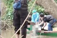 1767956778661-polisi-mengevakuasi-jasad-pria-tanpa-identitas-yang-ditemukan-di-sungai-musi-1767946353679_169
