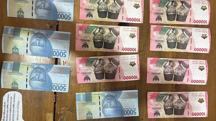 1768388788536-penampakan-uang-palsu-yang-hendak-diedarkan-pemuda-pengangguran-di-lampung-selatan-1768367273000_169