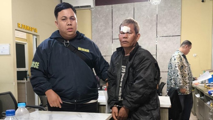 1768388793595-pelaku-persetubuhan-terhadap-anak-tiri-di-palembang-saat-diamankan-polisi-1768371537689_169