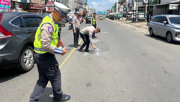 1768410394374-polisi-lakukan-olah-tkp-peristiwa-kecelakaan-yang-menewaskan-mantan-anggota-dprd-lubuklinggau-1768275910267_169