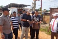 1769490383455-bupati-bbs-tinjau-jalan-buat-perbaikan-infrastruktur-di-simpang-petaling-1769441970340_169